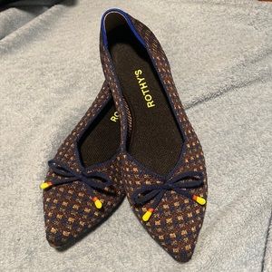 Rothy’s size 8.5w blue brown and gold with bows on toe
